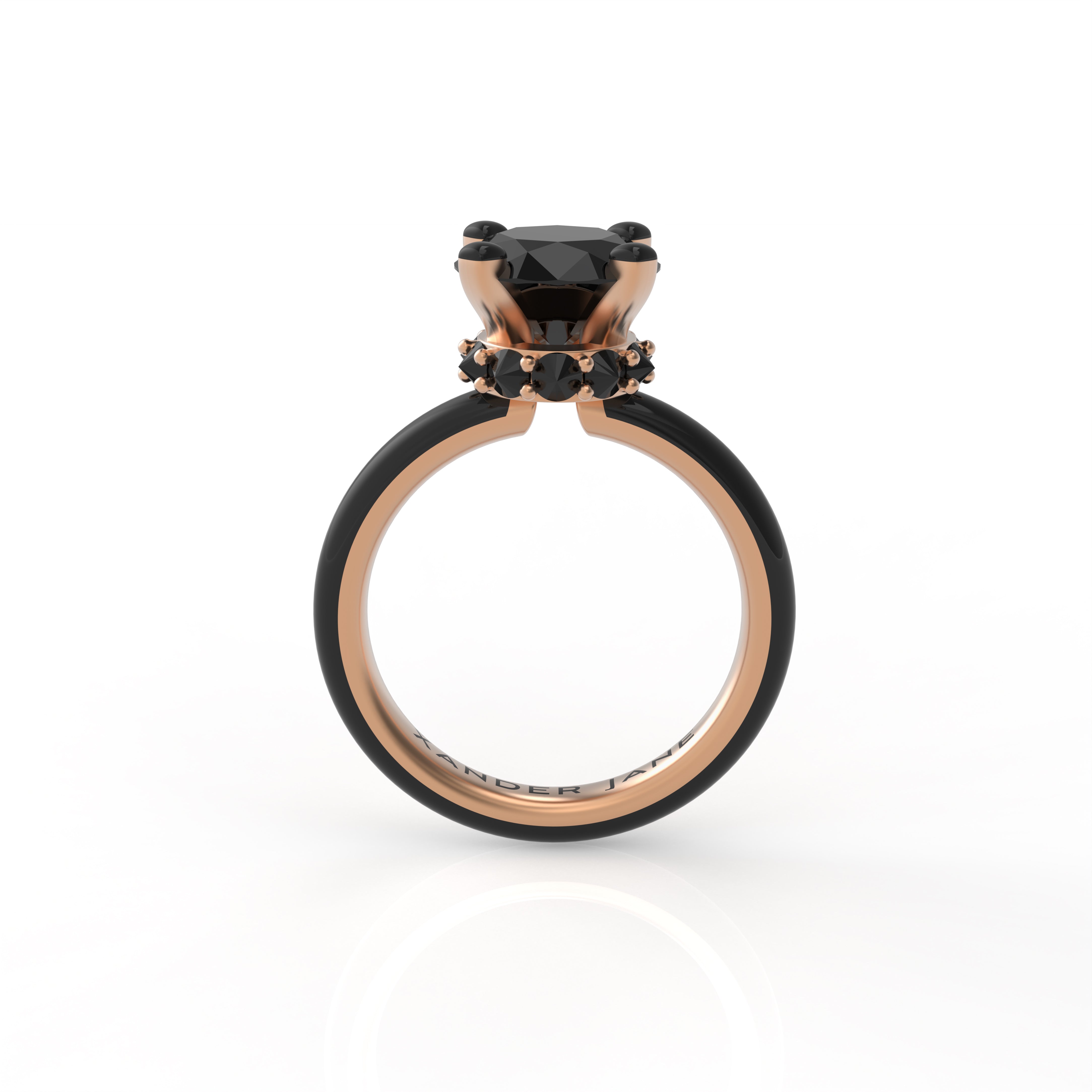 Front view of Eclipse engagement ring emphasizing the halo setting's dimensional design, featuring black diamonds set in 18K rose gold with black ceramic band