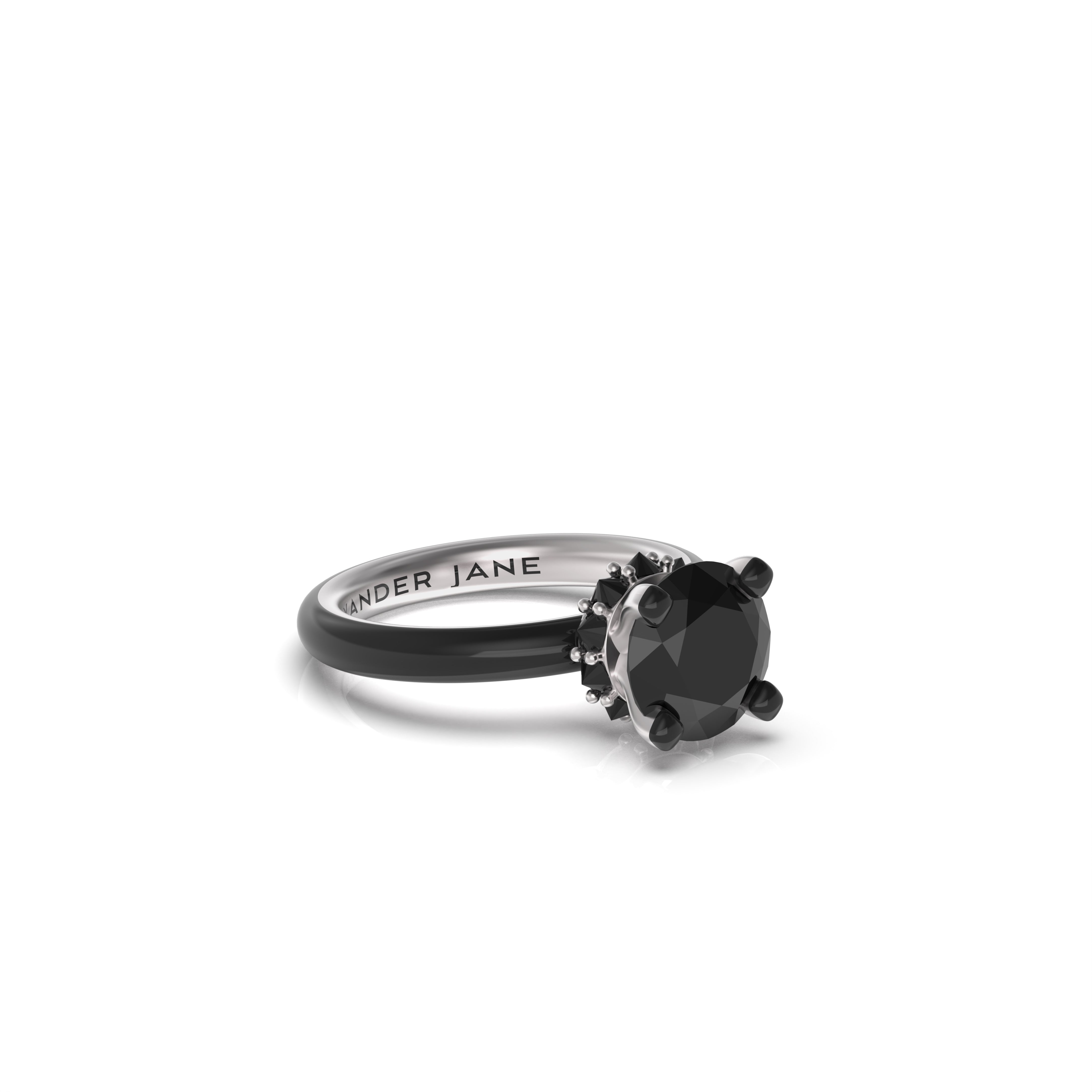 Eclipse black diamond ring in white gold with black ceramic band and reverse-set diamonds